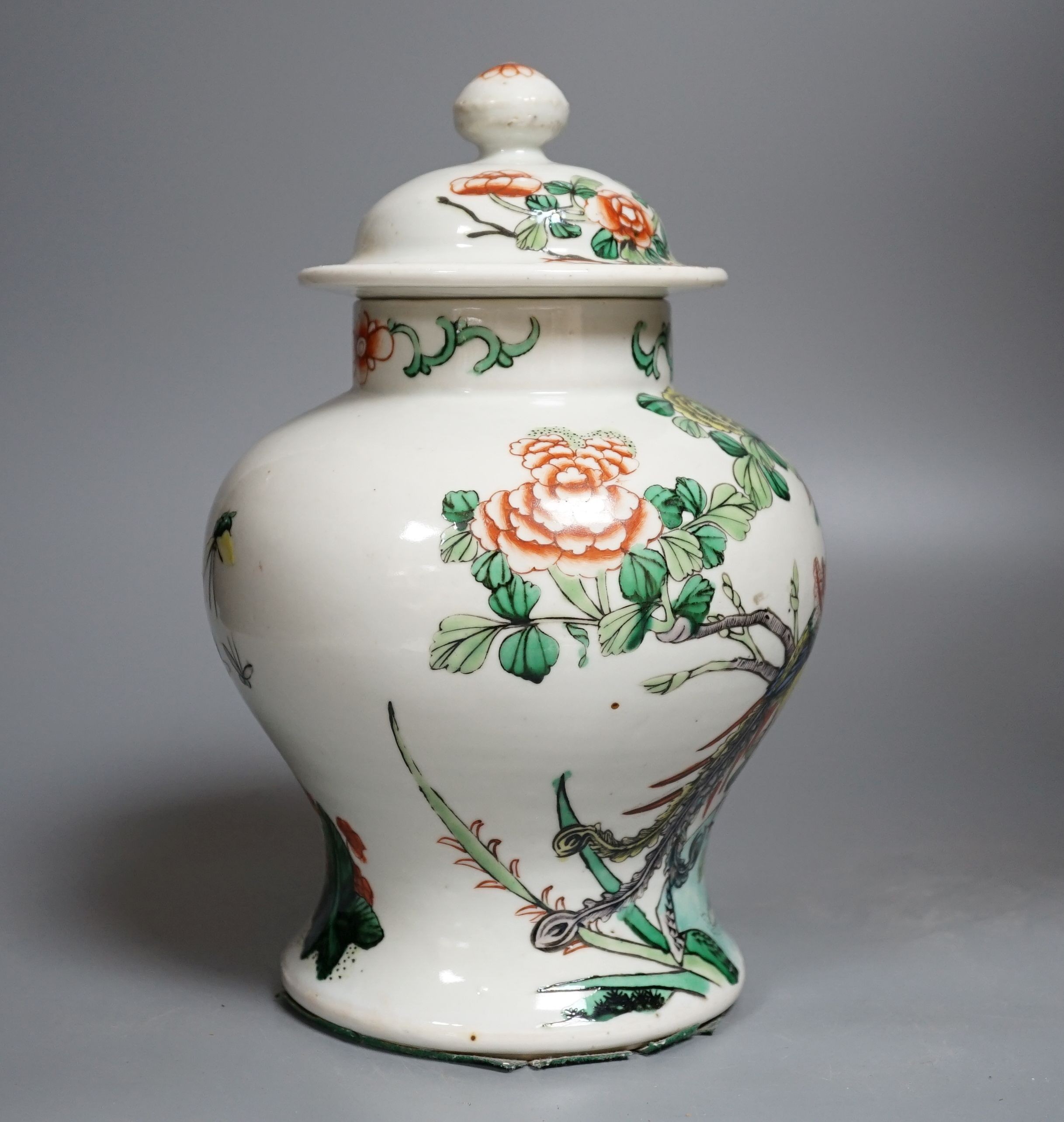 A Chinese Famille-Verte jar and cover decorated with Phoenix and flowers, 26cm